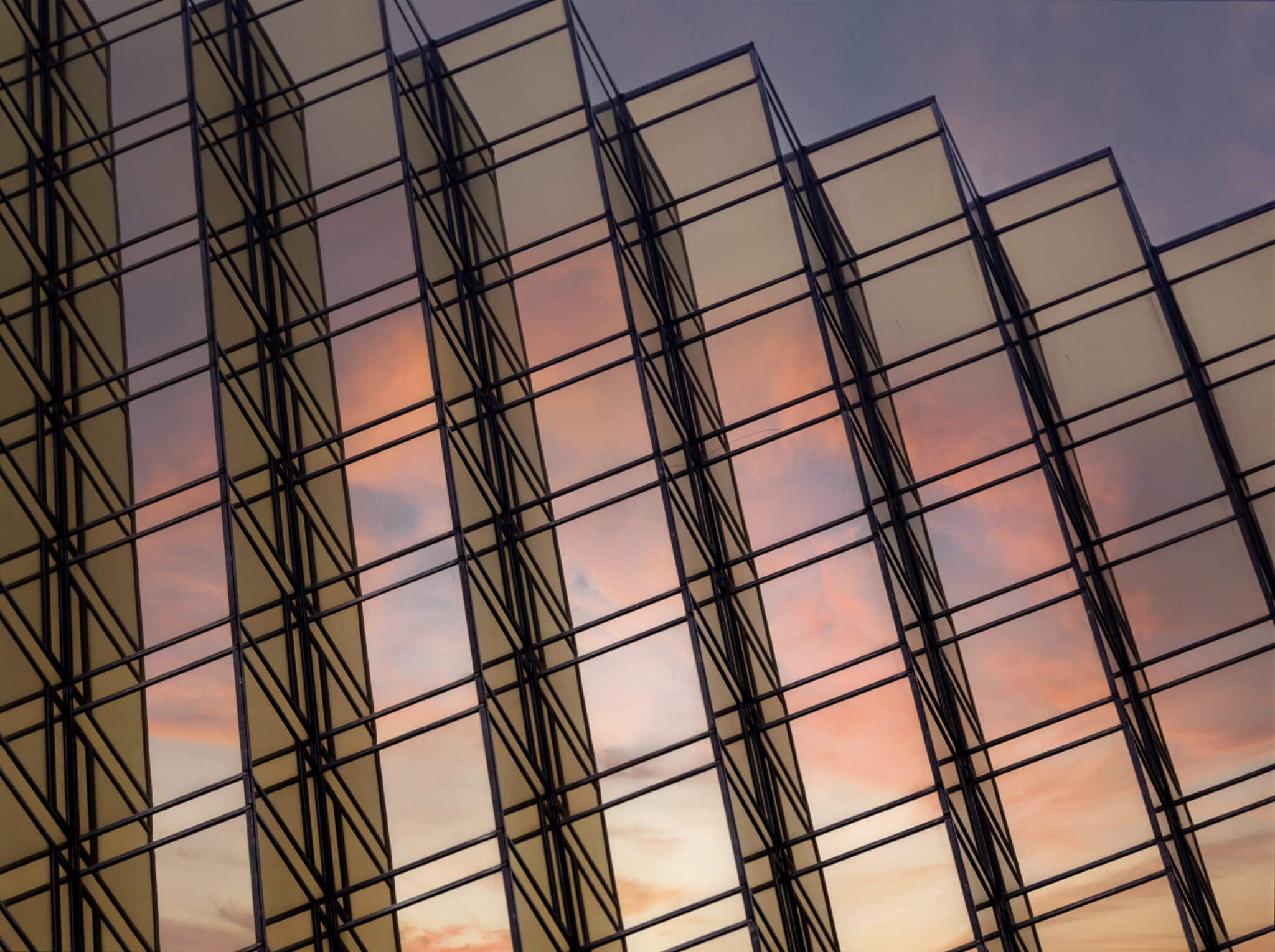 Skyscraper reflecting the sky at night