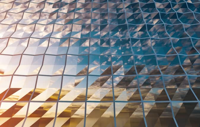 Sky reflected in skyscraper windows